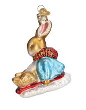 Load image into Gallery viewer, Peter Rabbit on a Sled Ornament - Old World Christmas
